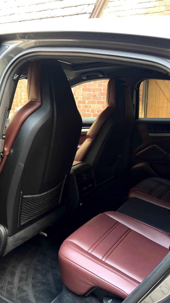 Rear seats in burgundy leather after cleaning and conditioning